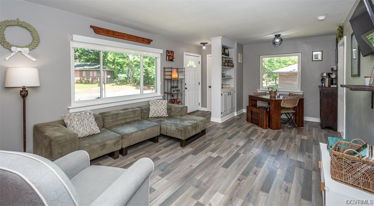 1025 Andros Road Richmond, VA 23225 - Photo 9 of 37 a living room with furniture and wooden floor