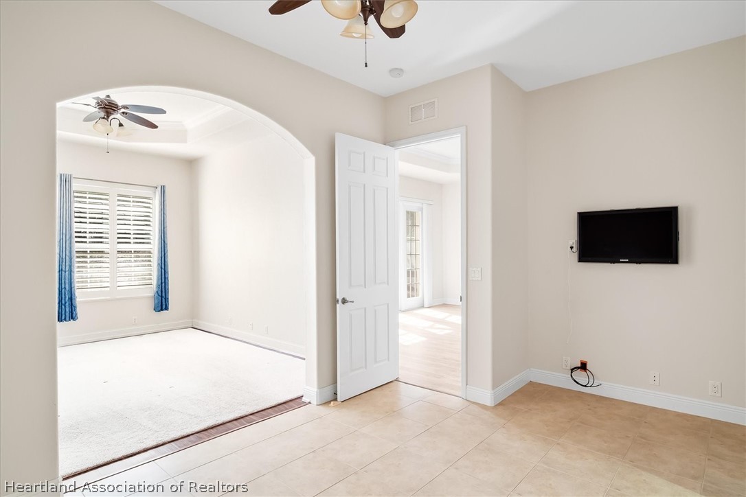 5224 Haw Branch Road Sebring, FL 33875 - Photo 18 of 40 a view of an empty room with a window