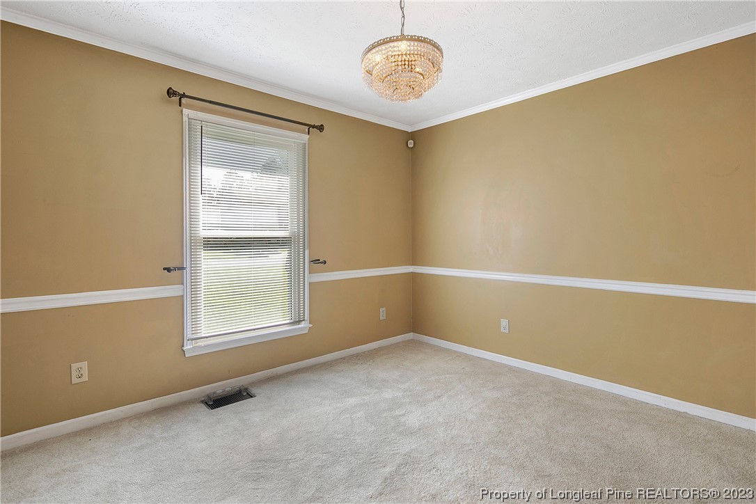 6875 Baystone Road Fayetteville, NC 28314 - Photo 11 of 50 an empty room with a window