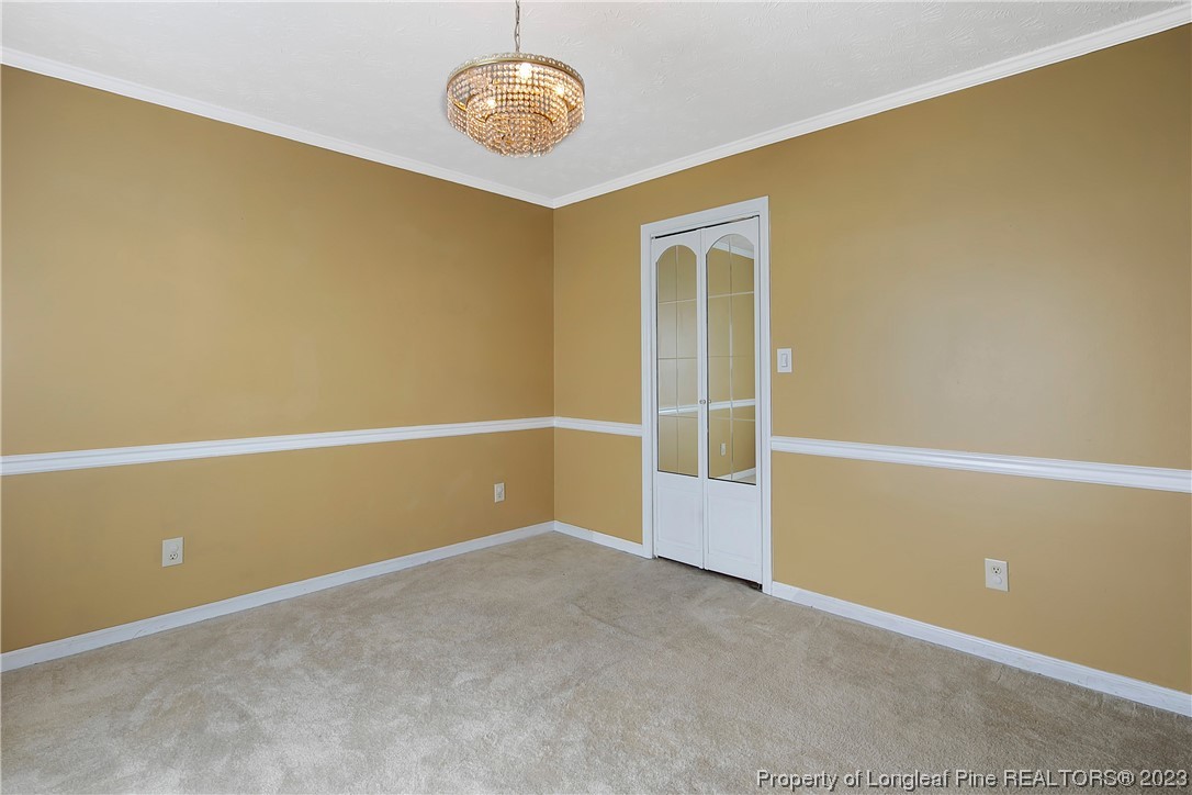 6875 Baystone Road Fayetteville, NC 28314 - Photo 12 of 50 an empty room with a empty space