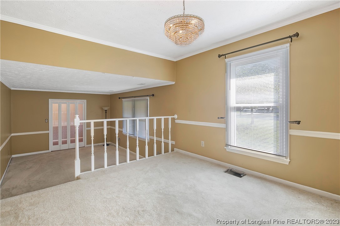 6875 Baystone Road Fayetteville, NC 28314 - Photo 14 of 50 a view of an empty room with a window