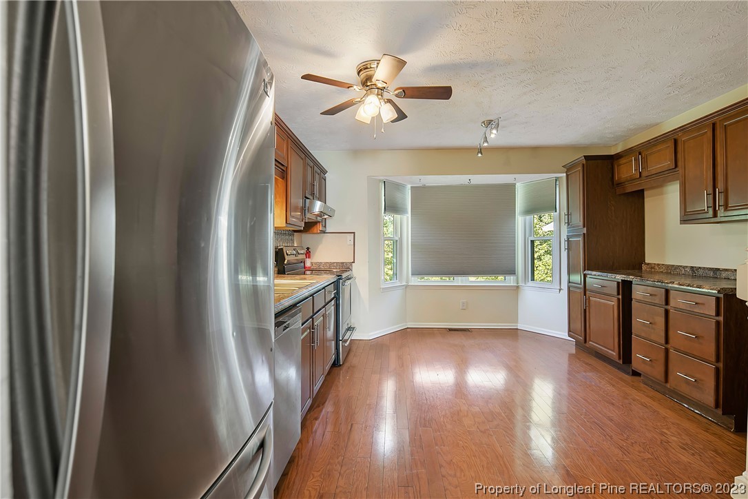 6875 Baystone Road Fayetteville, NC 28314 - Photo 15 of 50 a view of kitchen with sink and window