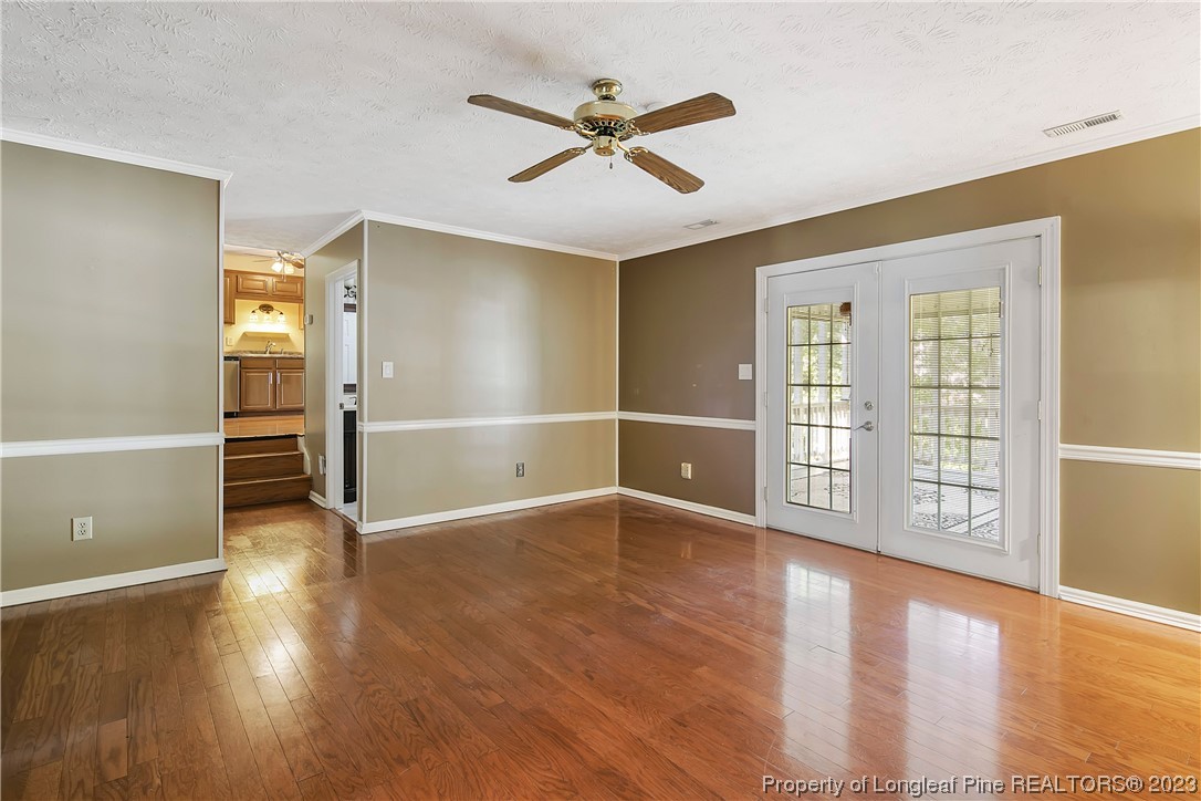 6875 Baystone Road Fayetteville, NC 28314 - Photo 28 of 50 wooden floor in an empty room with a window