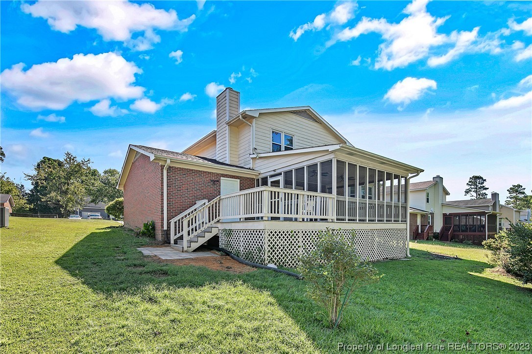 6875 Baystone Road Fayetteville, NC 28314 - Photo 48 of 50 a view of a house with a yard