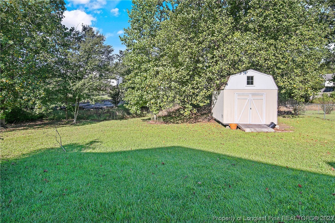 6875 Baystone Road Fayetteville, NC 28314 - Photo 49 of 50 a garden view with a space and garden