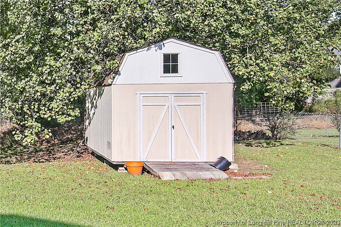 6875 Baystone Road Fayetteville, NC 28314 - Photo 50 of 50 a front view of a house with a yard