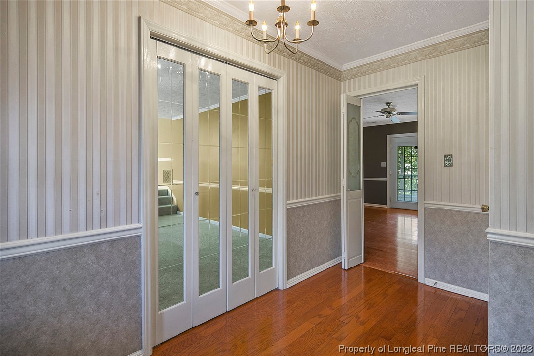 6875 Baystone Road Fayetteville, NC 28314 - Photo 6 of 50 wooden floor in an empty room