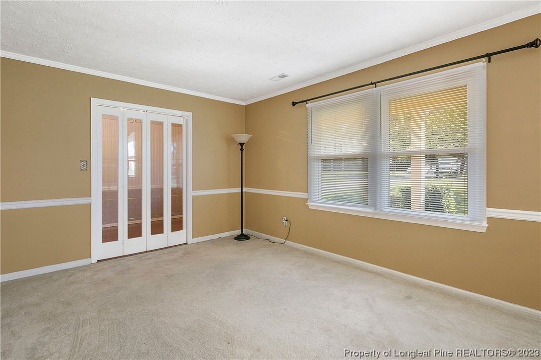 6875 Baystone Road Fayetteville, NC 28314 - Photo 10 of 50 a view of an empty room with a window