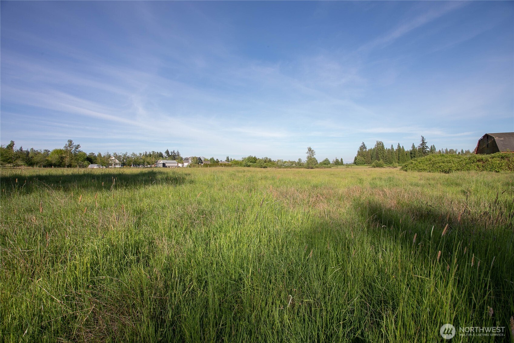 5958 North Star Road Ferndale, WA 98248 - Photo 12 of 18 a view of a lake with houses in the back