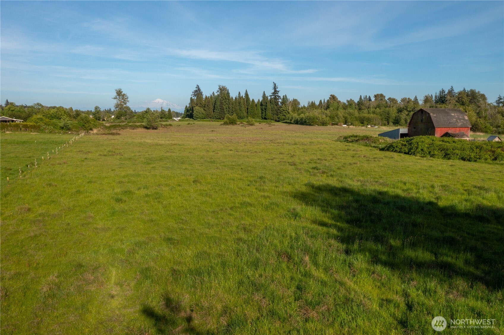 5958 North Star Road Ferndale, WA 98248 - Photo 17 of 18 a view of a big yard with lots of green space and fog