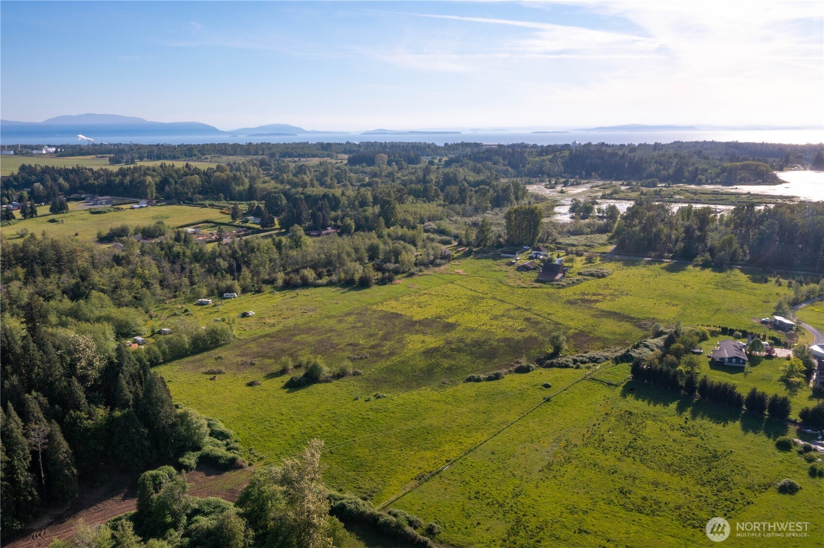 5958 North Star Road Ferndale, WA 98248 - Photo 9 of 18 a view of a city with mountains in the background