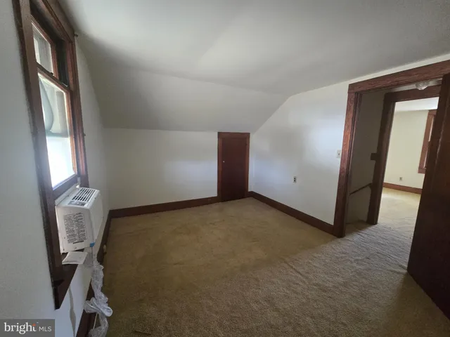 a view of a hallway with closet