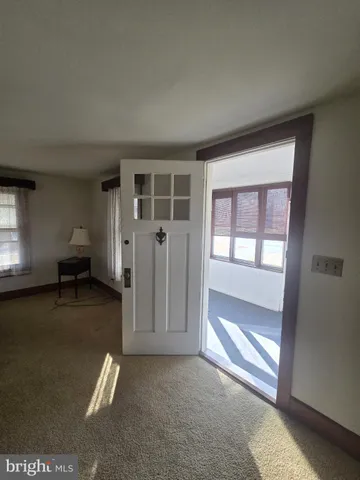 an empty room with windows