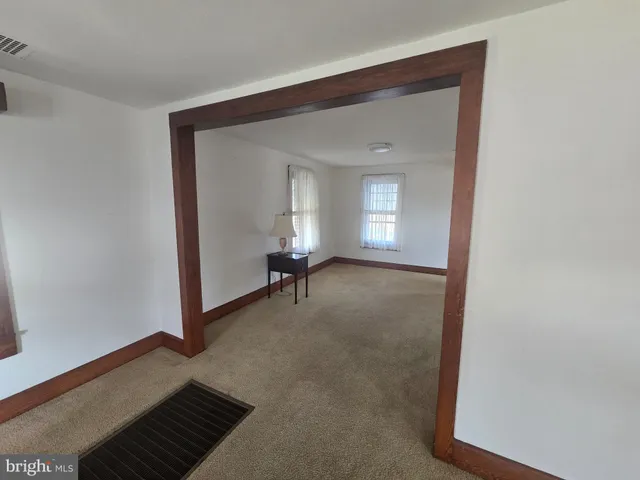 a view of a livingroom with a staircase