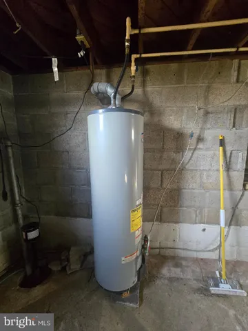a bathroom with a tub and shower