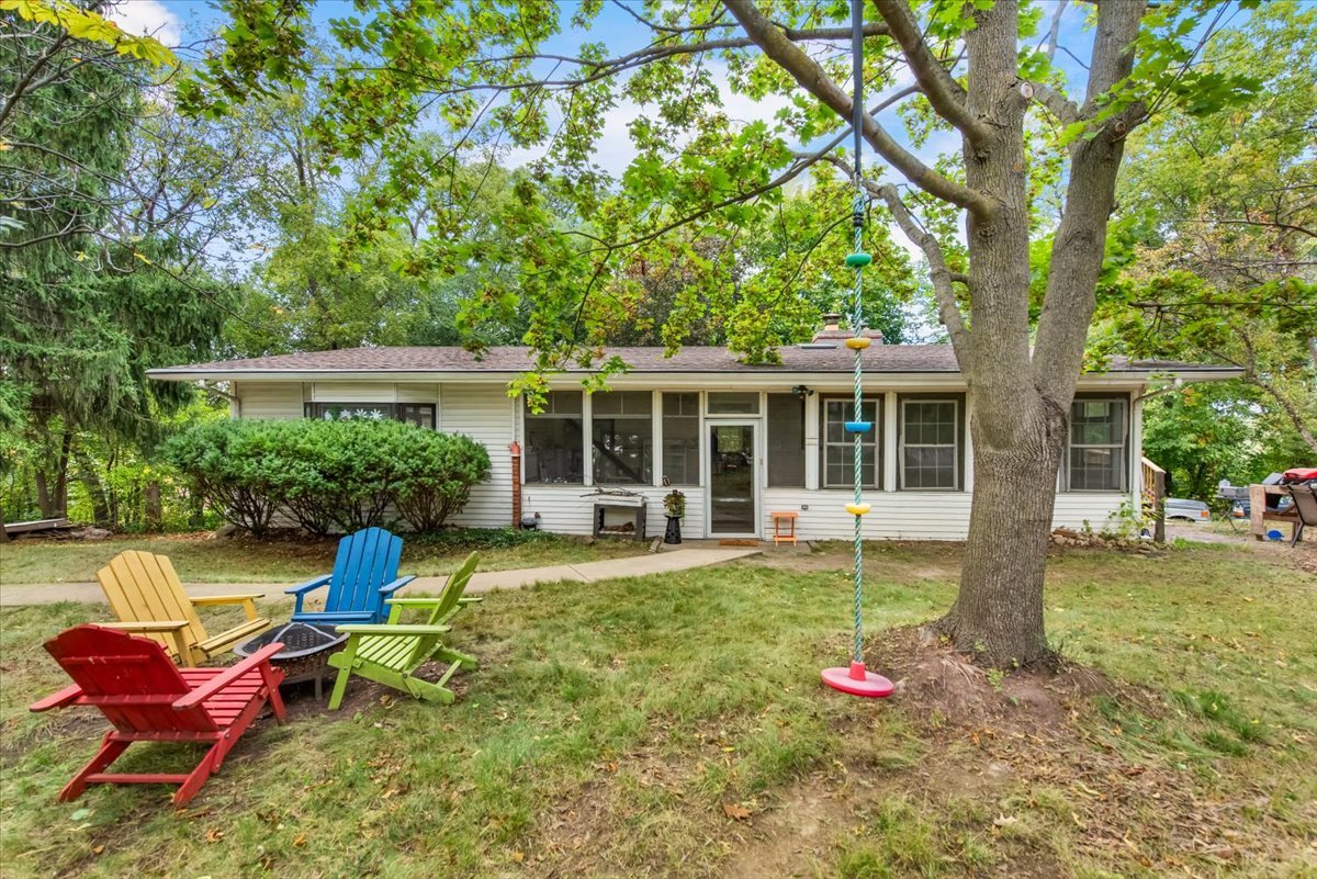 26 Glen Echo Road Elgin, IL 60120 - Photo 1 of 34 a swimming pool with outdoor seating and yard