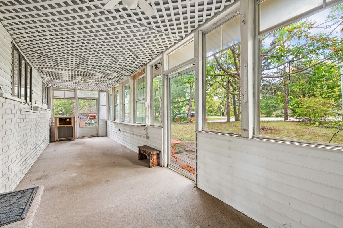 26 Glen Echo Road Elgin, IL 60120 - Photo 23 of 34 a spacious bedroom with a large window and a balcony