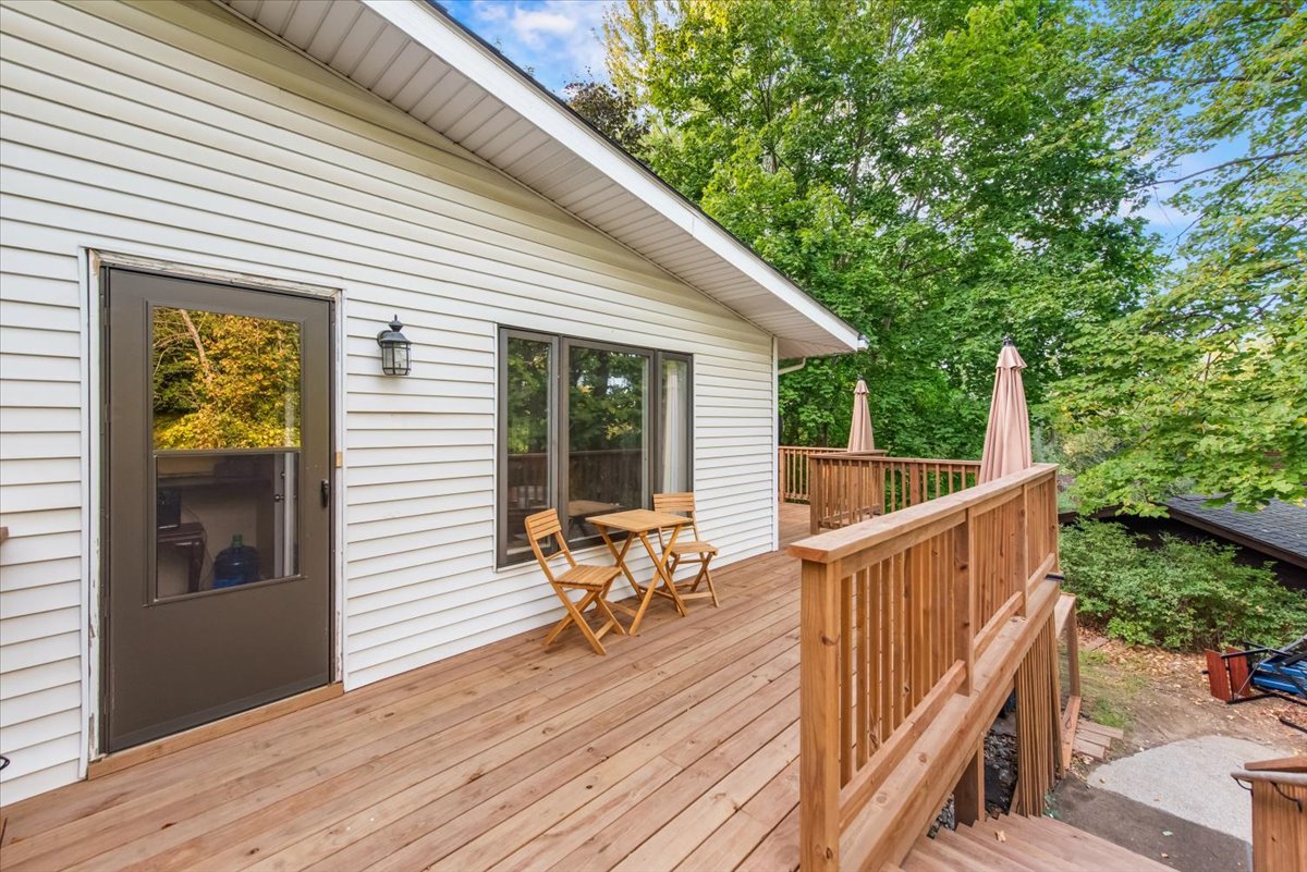 26 Glen Echo Road Elgin, IL 60120 - Photo 26 of 34 a view of deck with furniture and trees