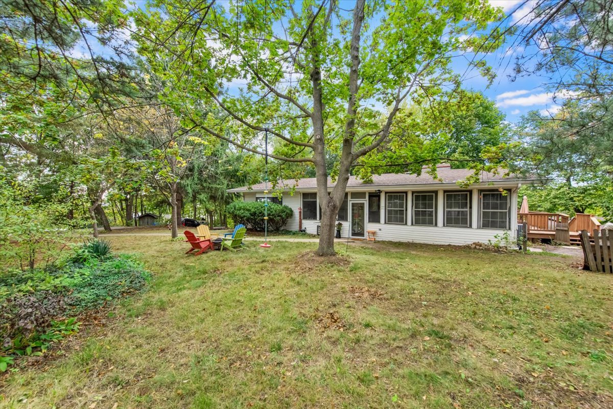 26 Glen Echo Road Elgin, IL 60120 - Photo 34 of 34 a view of a house with a backyard and a tree