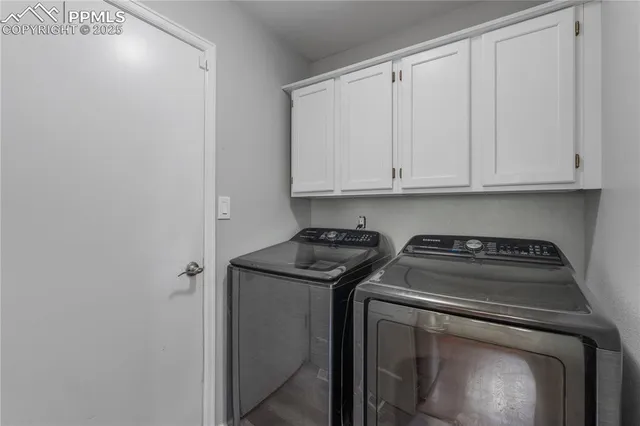 a view of a stove top oven sitting inside of a kitchen