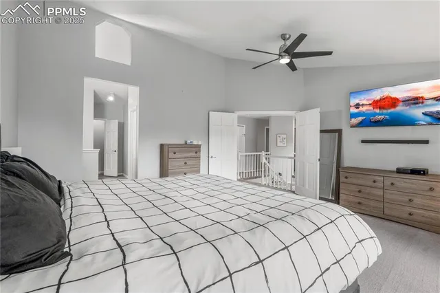 a bedroom with a bed and dresser