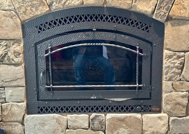 a close view of a fireplace in a room