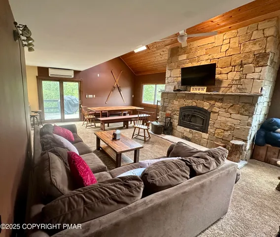 a room with a bed and a dresser in it