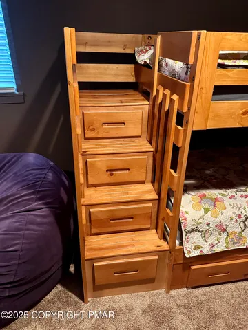 a bathroom with a toilet a sink and a mirror