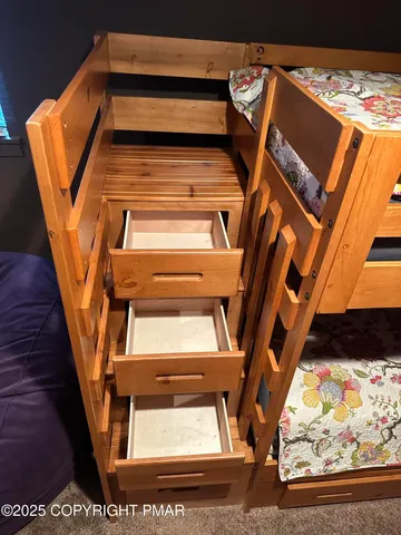 a bathroom with a toilet and a mirror