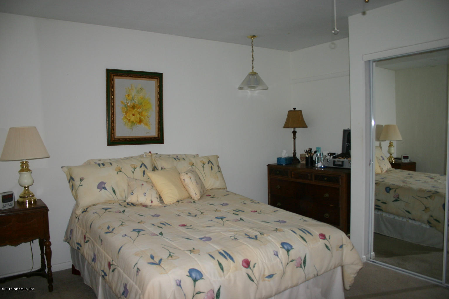 3969 Heidi Road Jacksonville, FL 32277 - Photo 11 of 29 a bedroom with a bed and a closet