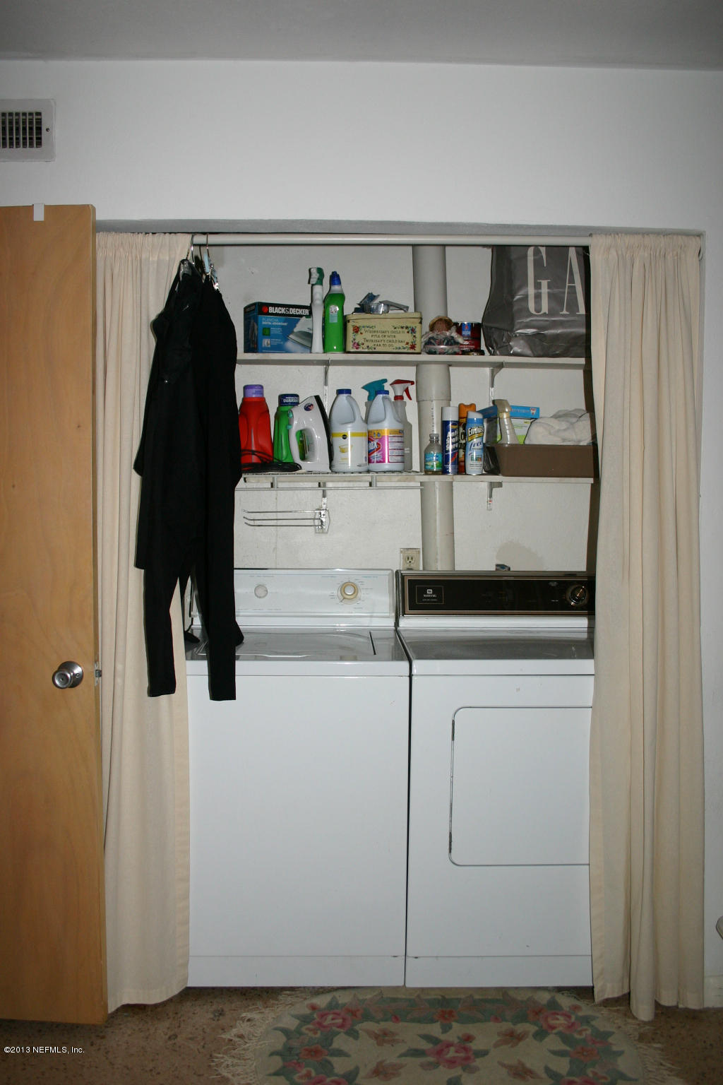 3969 Heidi Road Jacksonville, FL 32277 - Photo 16 of 29 a view of walk in closet with clothes and shoes