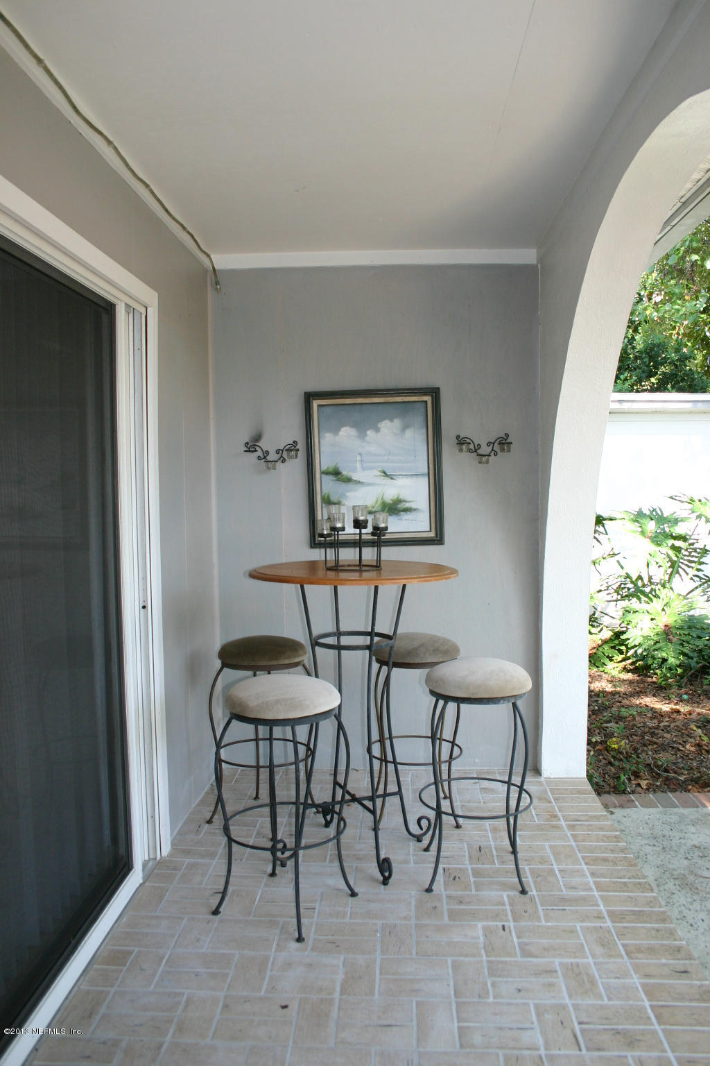 3969 Heidi Road Jacksonville, FL 32277 - Photo 25 of 29 a view of a livingroom with furniture and painting on the wall