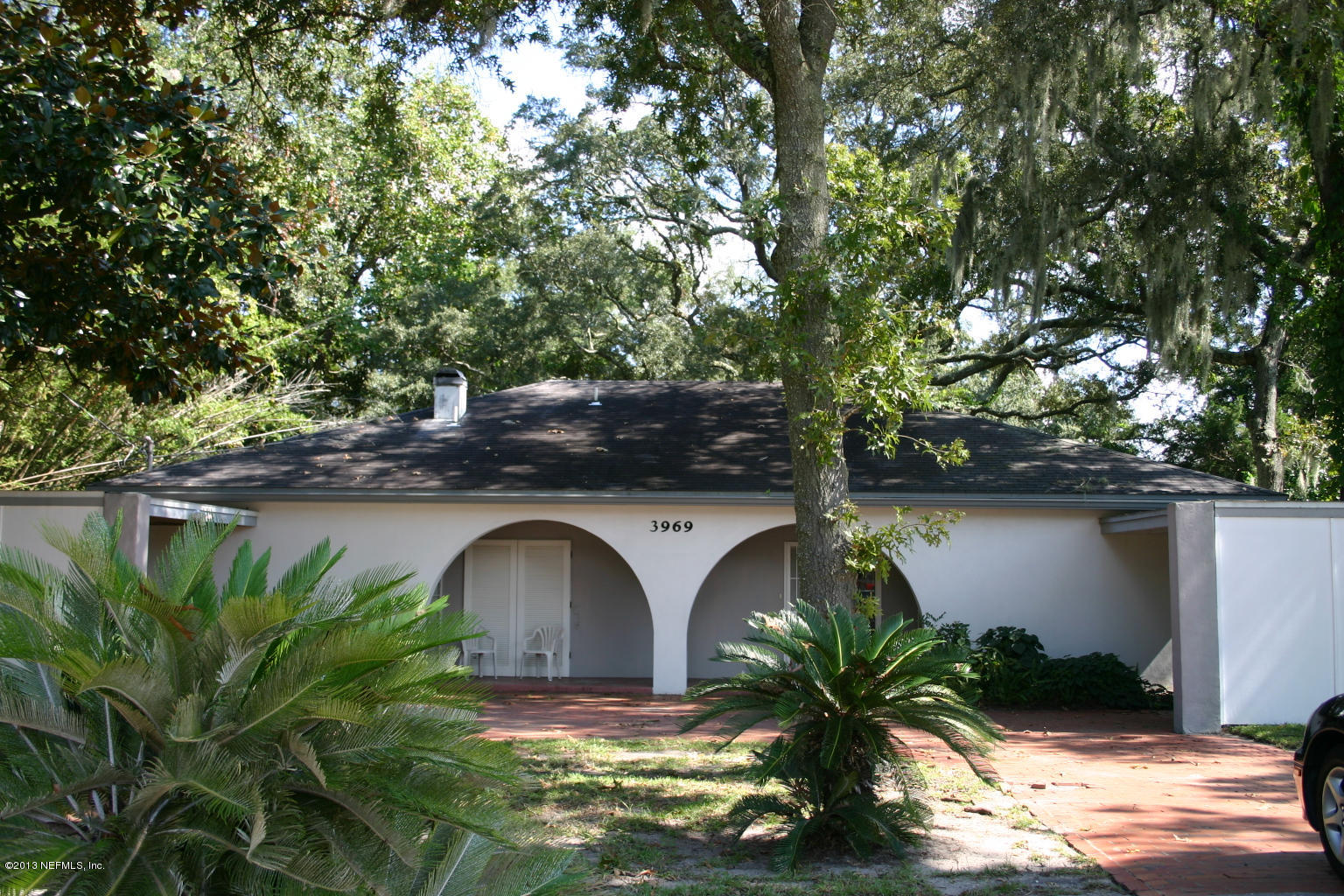 3969 Heidi Road Jacksonville, FL 32277 - Photo 29 of 29 a view of a house with a yard