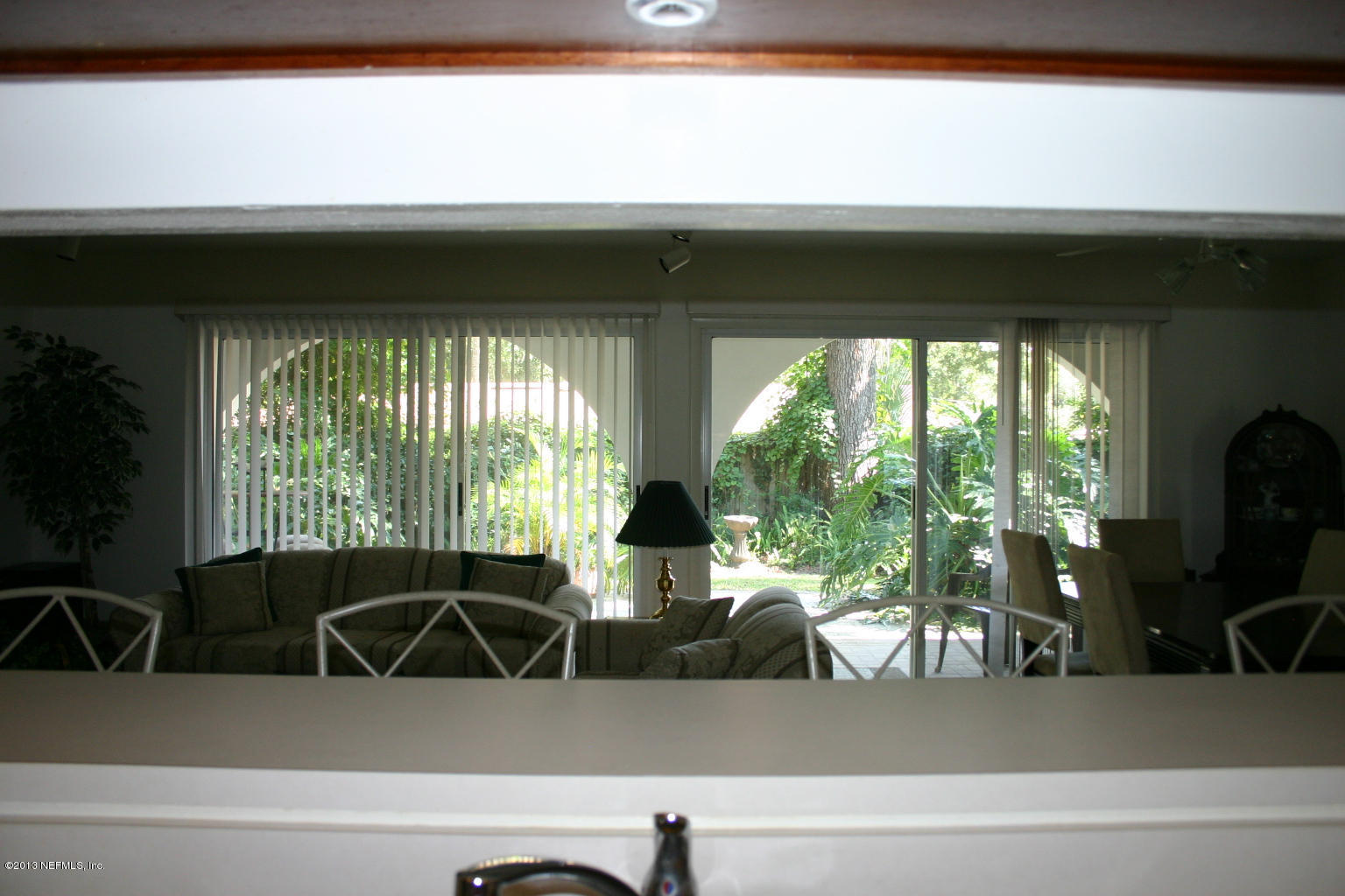 3969 Heidi Road Jacksonville, FL 32277 - Photo 7 of 29 a bathroom with a bathtub and next to a window