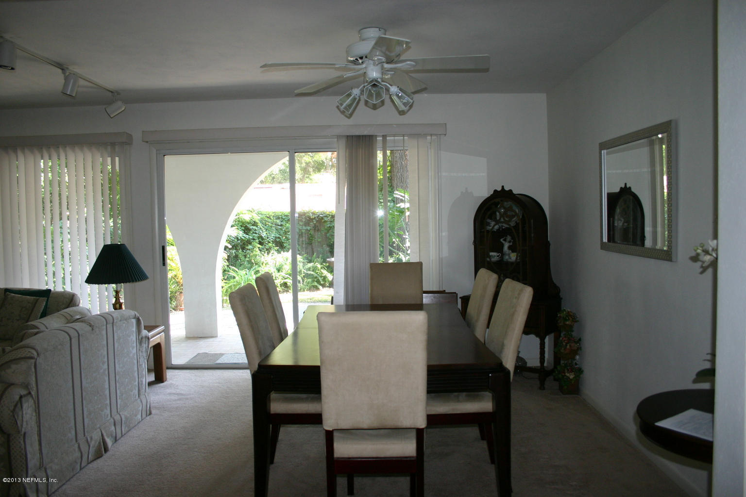 3969 Heidi Road Jacksonville, FL 32277 - Photo 9 of 29 a view of a dining room with furniture window and outside view