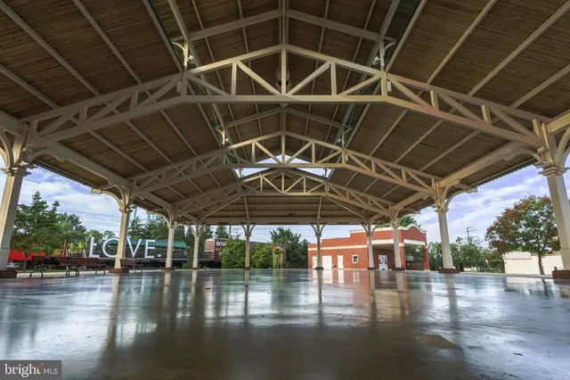 a view of a building with sitting area