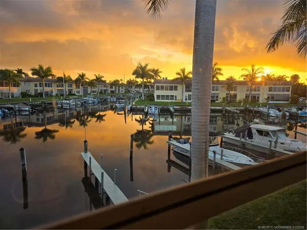 a view of a lake from a balcony