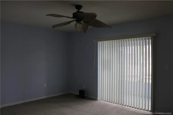 a view of a room with a fan