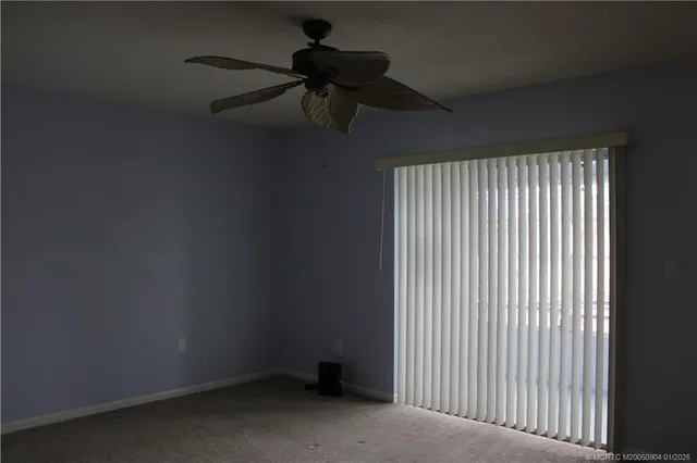 a view of a room with a fan
