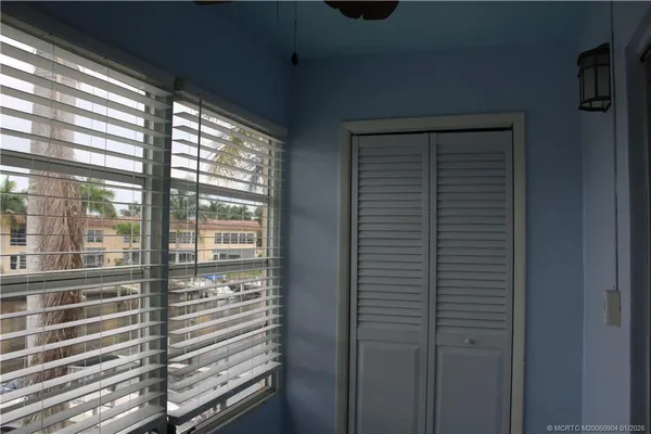 a view of a balcony and a window