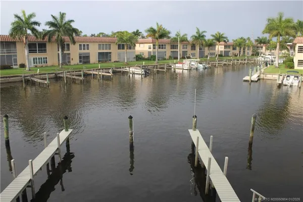 a view of a lake with building in front of it