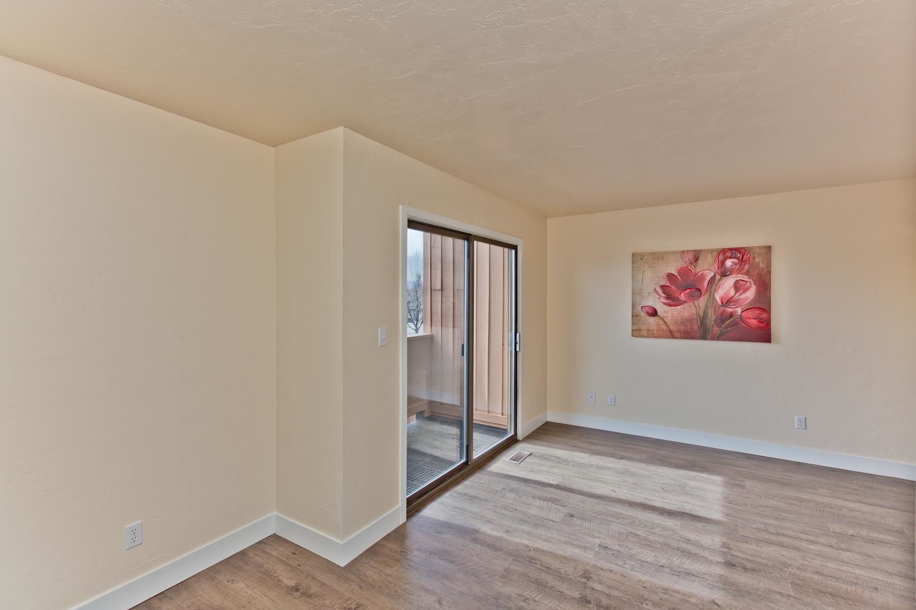 575-28 28 1/2 Road, Unit 44 Grand Junction, CO 81501 - Photo 13 of 39 a view of an empty room with wooden floor