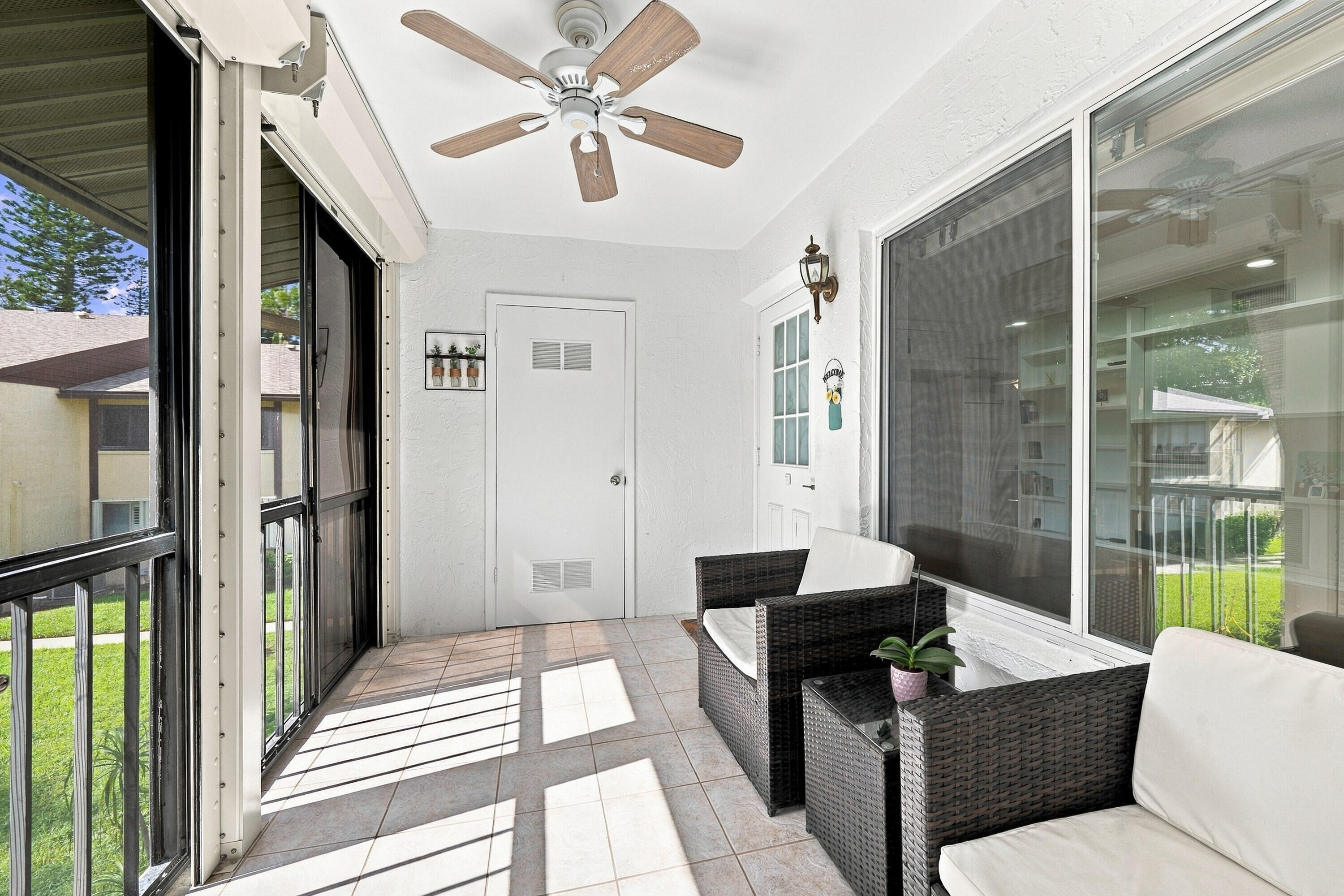 313 Pine Ridge Circle, Unit C2 Greenacres, FL 33463 - Photo 12 of 35 Covered patio