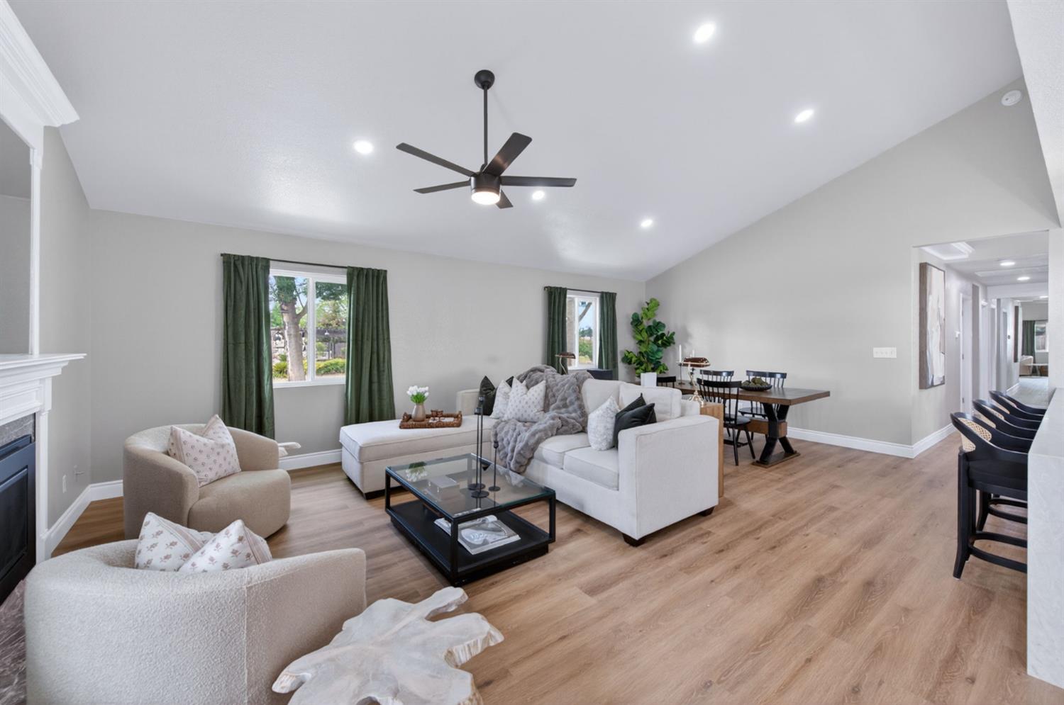 16564 Monreal Road Madera, CA 93636 - Photo 8 of 59 a living room with furniture and a window