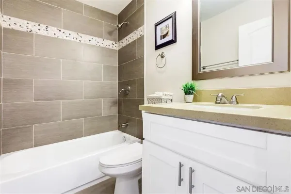 a bathroom with a sink and a bathtub