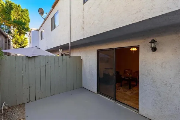 a view of a house with a street