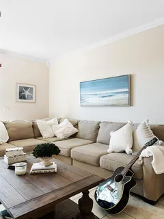 a living room with furniture and a couch