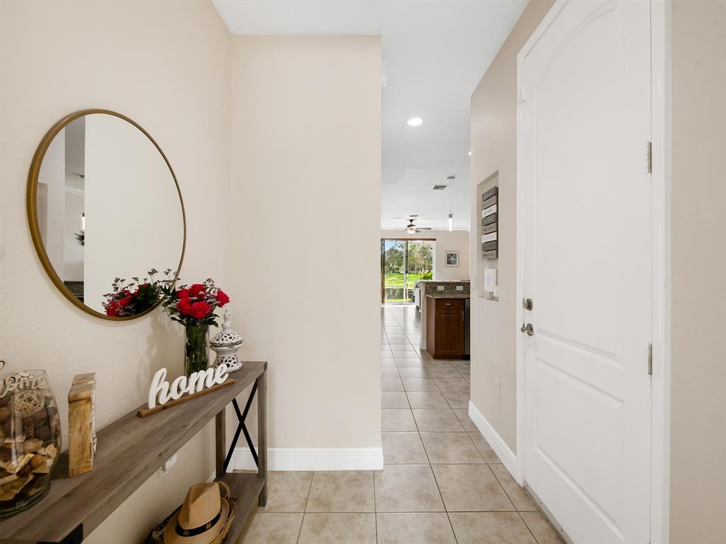 4792 Sundance Way, Unit 4792 Davie, FL 33328 - Photo 15 of 33 a very nice looking room with a potted plant