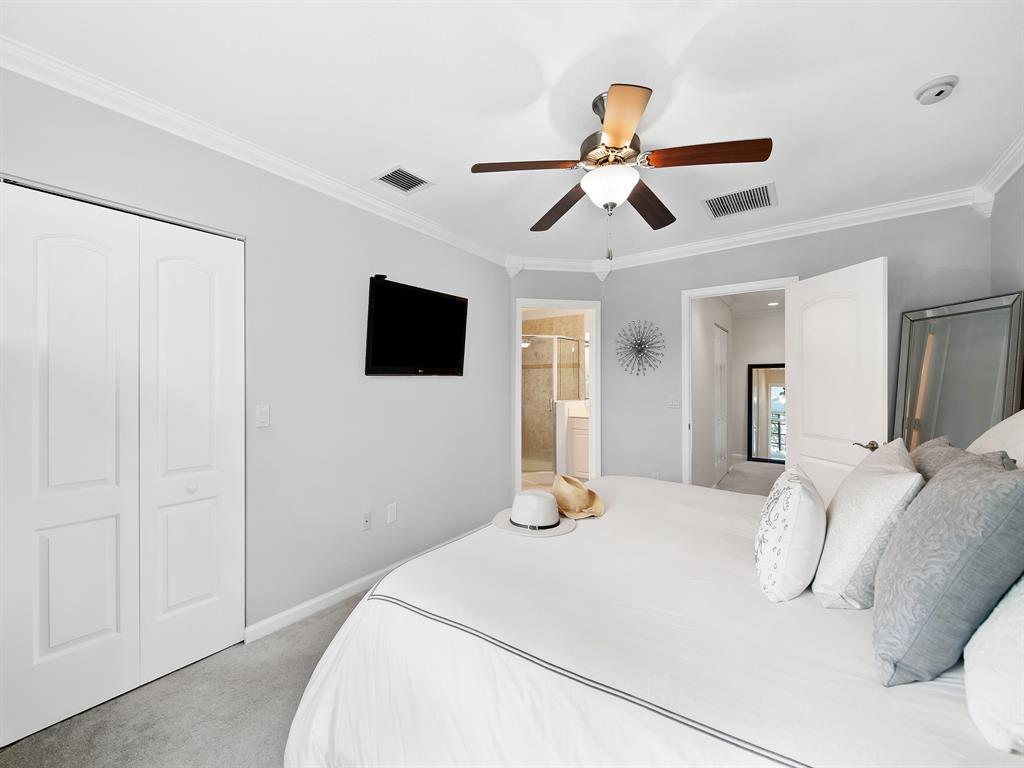 4792 Sundance Way, Unit 4792 Davie, FL 33328 - Photo 17 of 28 a bedroom with a bed and a flat screen tv