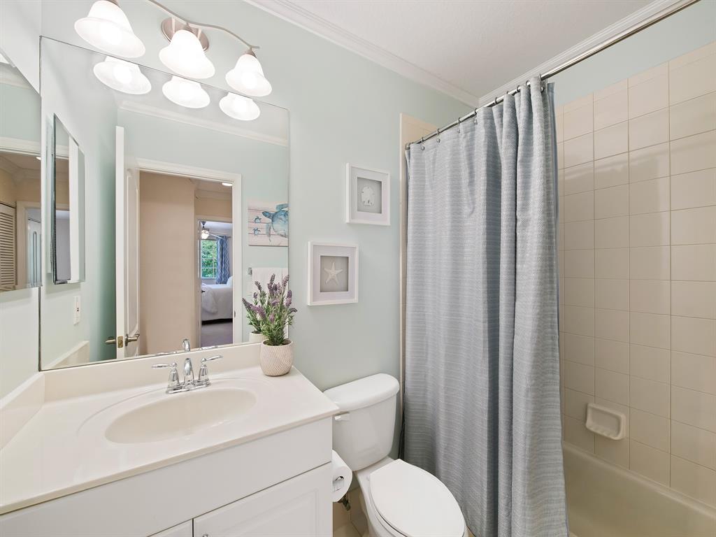 4792 Sundance Way, Unit 4792 Davie, FL 33328 - Photo 27 of 33 a bathroom with a sink vanity mirror and toilet